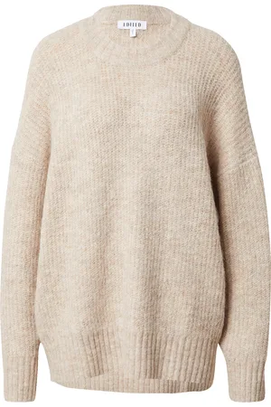 EDITED the label Oversized neulepaita 