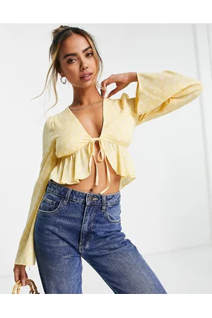 The Frolic Floral bell sleeve cropped blouse in marigold