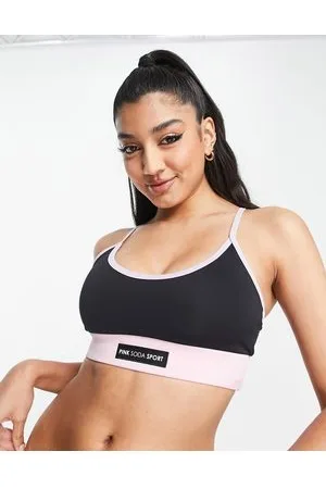 Pink Soda Sport cutout medium support sports bra in black python print