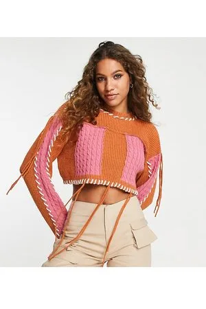 ASOS DESIGN crop cable sweater with fringe in chenille yarn in pink