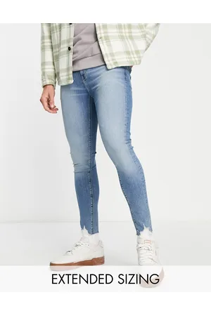 ASOS Spray on jeans with power stretch in light wash with ripped hem detail