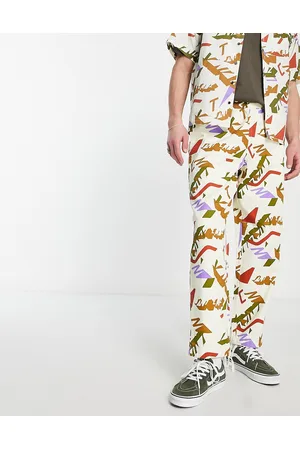 Santa Cruz Classic label unisex co-ord trousers in with all over logo print