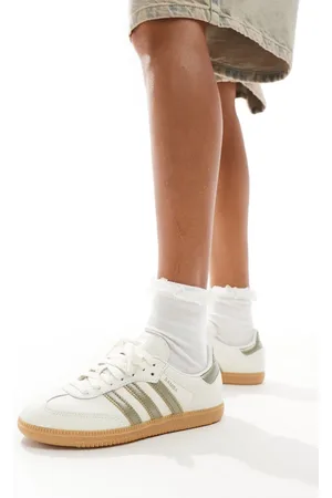 adidas Samba - Sneakers i råhvid og guldfarve