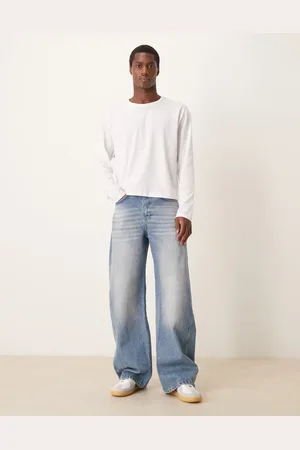 ASOS Superposede jeans med snoede sømme i blå mellemvask