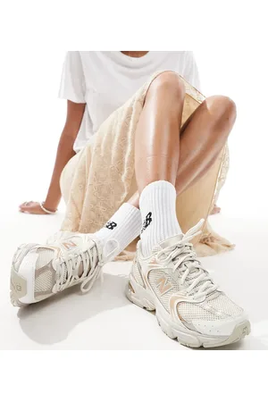 New Balance 530 - Sneakers i lys og metallisk guldfarve - Kun hos ASOS