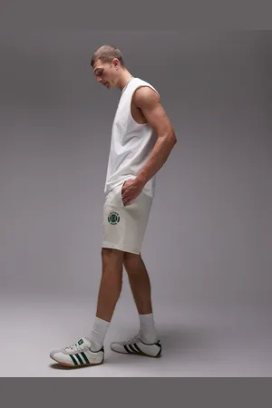 Lacoste Hvide jerseyshorts med tennisemblem