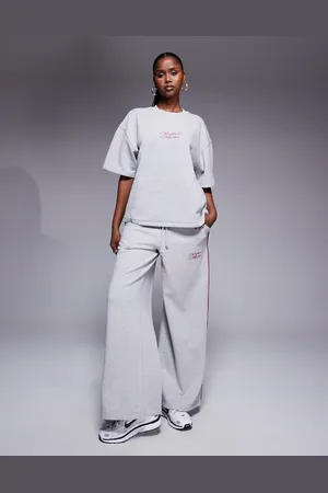 ASOS Weekend Collective - Gråmelerede og blommefarvede joggingbukser med vide ben og kantbåndsdetaljer