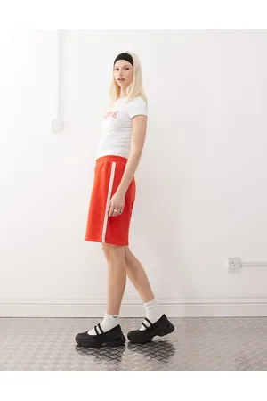COLLUSION Røde posede longline-shorts
