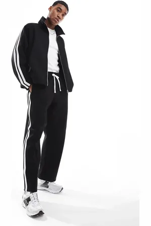 JACK & JONES Sorte joggingbukser med sidestriber i løstsiddende pasform - Del af sæt