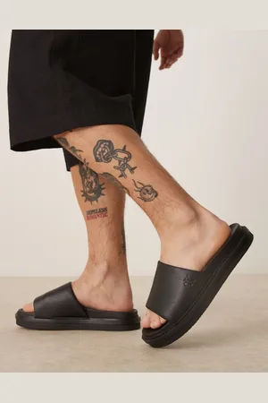 Calvin Klein Sorte badesandaler med præget design