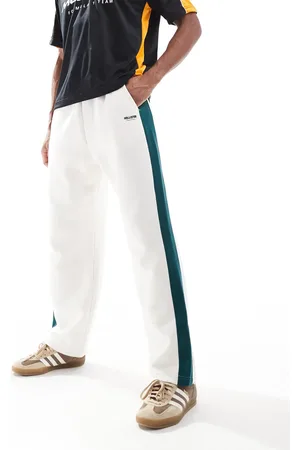 Hollister Cremefarvede og baggy joggingbukser i varsity-stil med striber i siderne-Neutral
