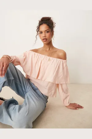 AWARE Lyserød statement-top med offshoulder-snit