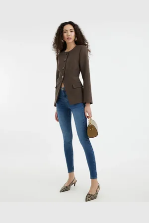 River Island Blå formende skinny-jeans i mellemvask