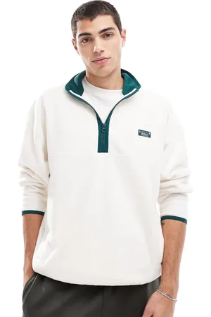Hollister Cremefarvet top i fleece med halv lynlås og motivdetalje-Hvid