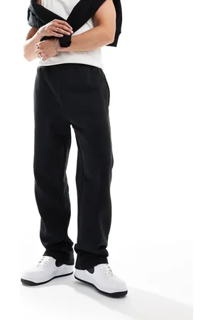 New Era Sorte joggingbukser med vide ben og logo