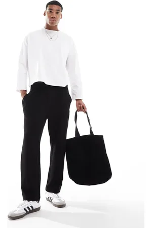 Only & Sons Sorte joggingbukser i tapered fit i strik med syning fortil
