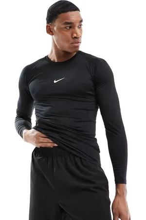 Nike Nike - Pro Training - og tætsiddende T-shirt med lange ærmer