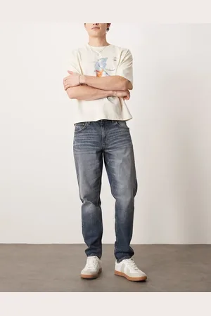 ASOS Blå Tapered jeans med stræk i mid wash blå