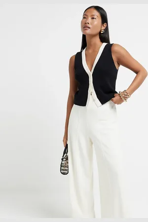 River Island Petite - Cremefarvede bukser med vide ben og plisseringer-Hvid