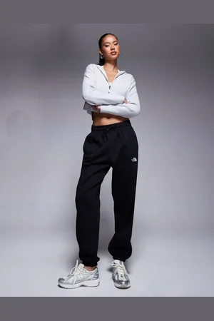 The North Face Essentials - Sorte og afslappede joggingbukser med tætsiddende benkant og logo