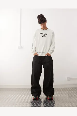 Cheap Monday Looser - Sorte løse jeans i skyllet vask