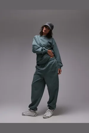 Topshop Community - Grønne joggingbukser med tætsiddende buksekanter og grafisk print - Del af sæt