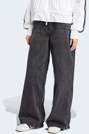 adidas Adilenium Season 3 - Jeans med lynlås i siden i denim i mørkeblå vask