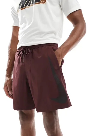Nike 7-tommer-shorts med Swoosh-grafik-Rød