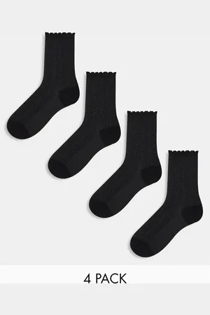 Lindex Pakke med 4 sorte sokker med struktur og muslingekant