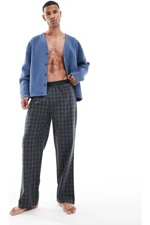 River Island Mørkegrønne vævede pyjamasbukser med tern