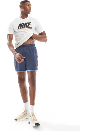 Nike Heritage - Blå og vævede 5-tommershorts