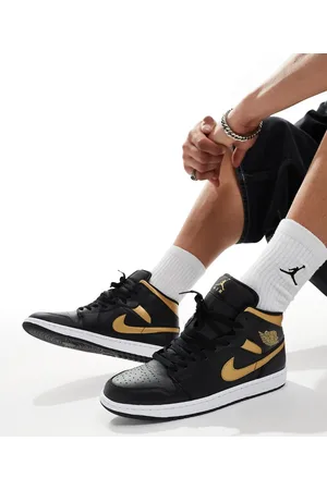 Jordan Air 1 Mid - Sneakers i /guldfarve