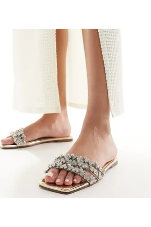Simmi London SIMMI London Wide Fit - Capri - Udsmykkede flade sandaler i guldfarve