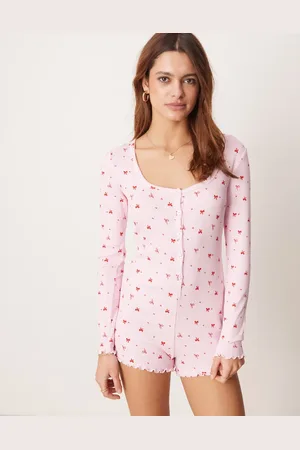 Boux Avenue Ribstrikket playsuit med sløjfeprint