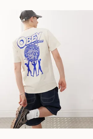 Obey Uplift - Cremehvid T-shirt med logografik og print på ryggen