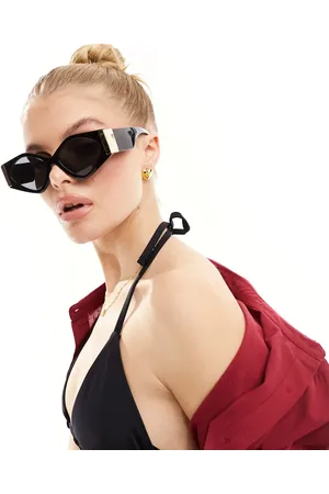Jeepers Peepers Sorte cat eye-solbriller med guldfarvede detaljer
