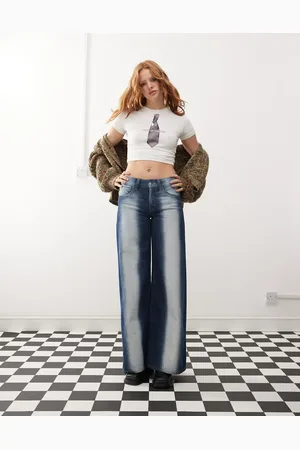 Cheap Monday Poser - Vaskede blå skaterjeans med mellemhøj talje, vide ben og ekstrem sprayeffekt