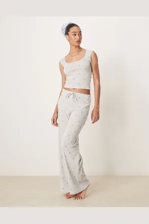 Gina Tricot Mix og match - Gråmelerede pyjamasbukser i pointelle af bomuld med broderi i kanten og blåt sløjfeprint