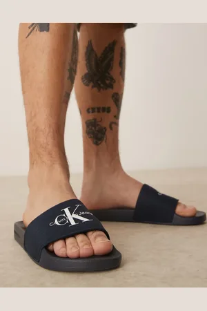 Calvin Klein Marineblå sliders med stort logo