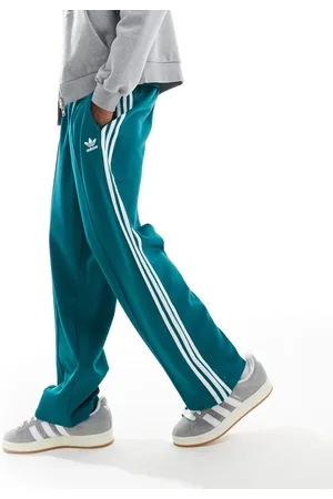 adidas Firebird - Turkisblå løstsiddende træningsbukser