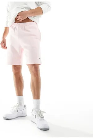 Lacoste Lyserøde shorts i jersey med logo