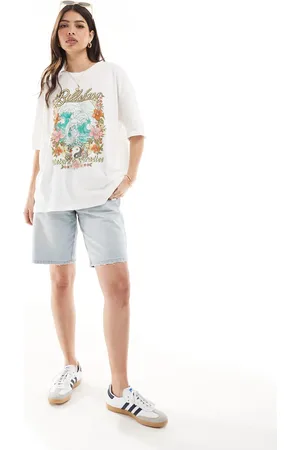 Billabong T-shirt med "Return to Paradise"-tekst
