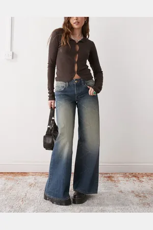 Cheap Monday Poser - Blå og forvaskede skater-jeans med mellemhøj talje og vide ben samt falmede highlights