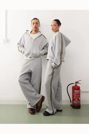 Reclaimed Gråmelerede unisex-joggingbukser med vide ben og ternet stribe i siden