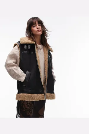 Topshop Vest i ruskind med imiterede lammeskindskanter