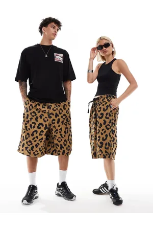 COLLUSION Unisex - Longline-shorts med leopardprint-Blå