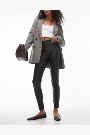 MANGO Sorte leggings med elastisk talje i imiteret læder i slim fit