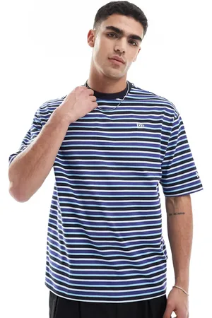 New Era T-shirt med kontrasterende logo og lodrette, multifarvede striber