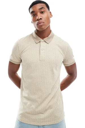 Hollister Gyldenbrun polo med geometrisk print og ikonlogo i piqué