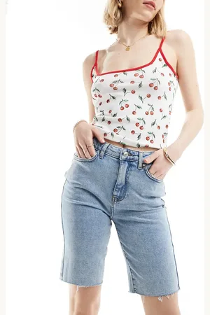 ONLY Emily - Longline-denimshorts med mellemhøj talje og rå kanter i lyseblå vask